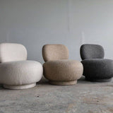 Fotoliu boucle pouf cu design rotunjit, tapiterie texturata premium, ideal pentru living modern