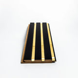 Riflaj decorativ din MDF Negru cu insertii gold– ideal pentru decor interior modern și elegant.